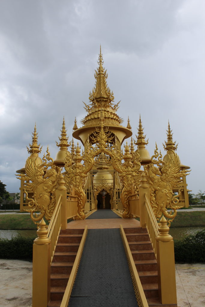golden temple at the white temple chiang rai
