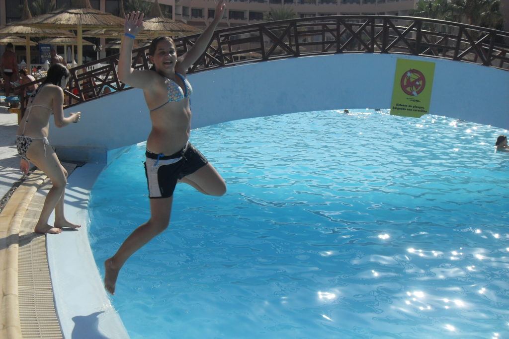 Life of a Passion jumping in the swimming pool of her hotel in Hurghada