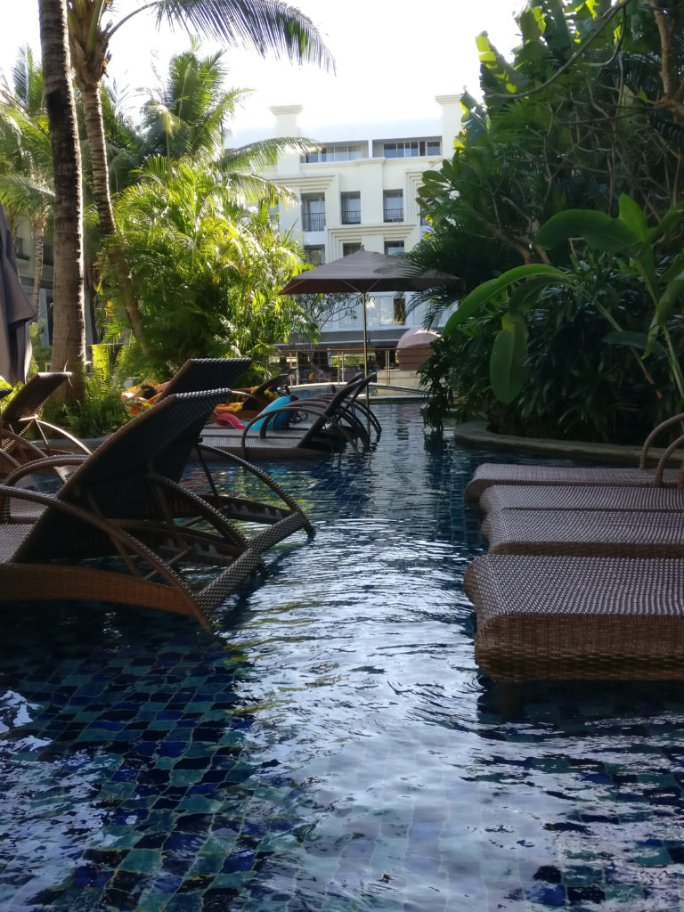 the swimming pool of the swiss-belresort watujimbar in Bali, Indonesia