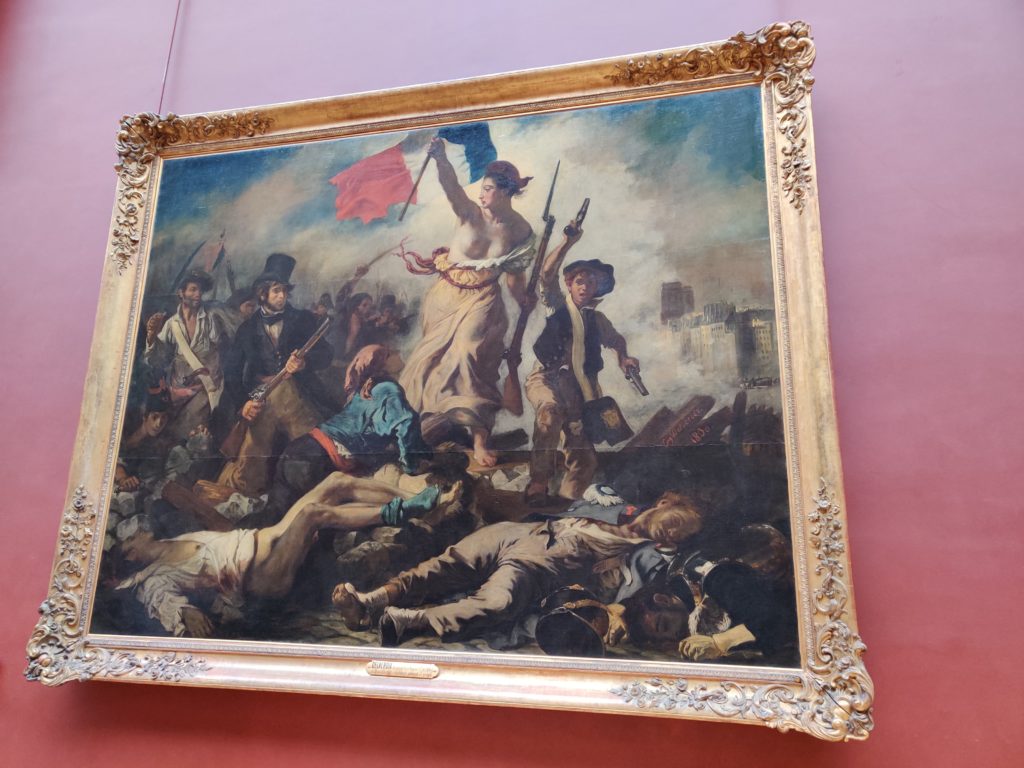 Liberty leading the people painting at the louvre in Paris, France