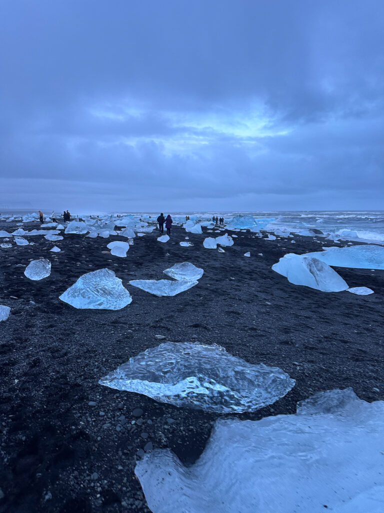 Diamond Beach – Breiðamerkursandur in Icelandic - a black sand beach with icebergs washed up on its shore from Breiðamerkurjökull glacier and Jökulsárlón lagoon on the South coast of Iceland